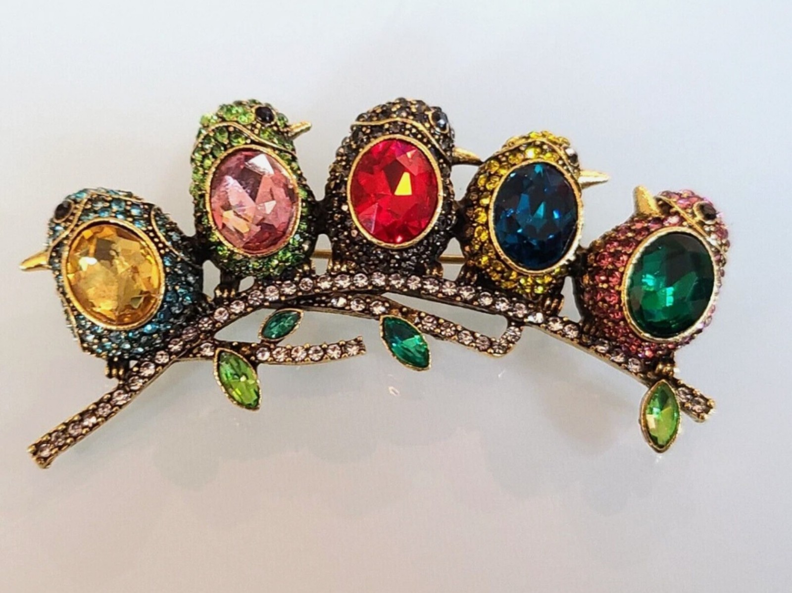 This  is a delightful  HEIDI DAUS 5 COLORFUL SONG BIRDS ON A BRANCH WITH LEAVES