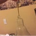 Hanging lightbulb glass planter