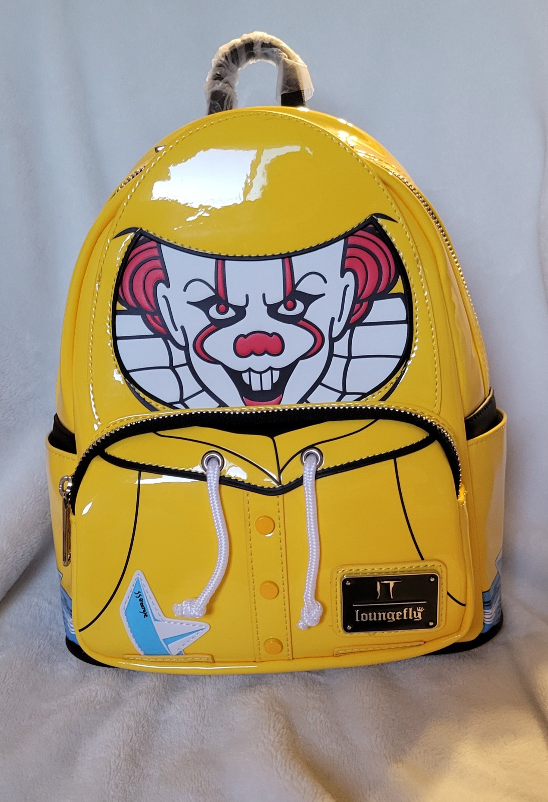Loungefly IT Pennywise Georgie's Raincoat Glow-In-The-Dark Mini Backpack