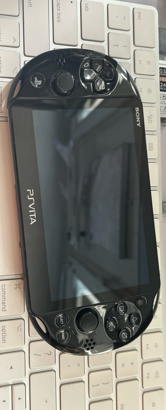 PlayStation Vita W/ 64GB Sd2Vita Adapter