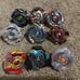 Beyblades; launchers; arenas