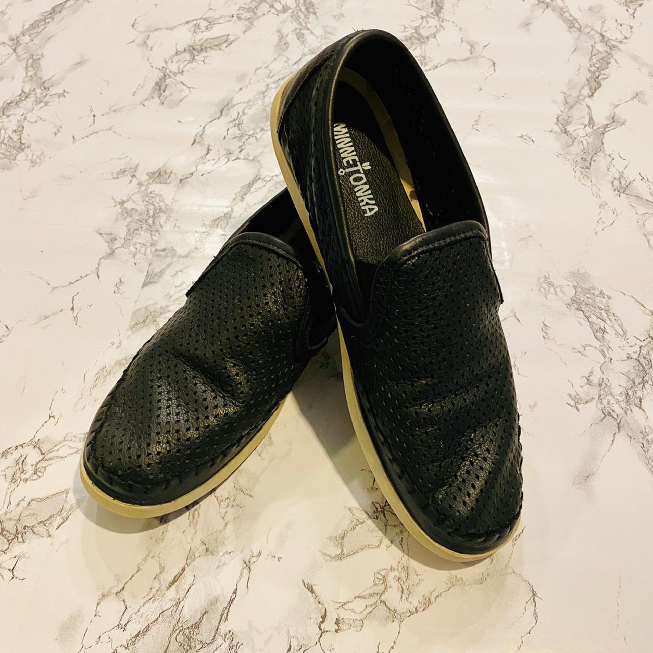 Minnetonka Pacific Black Leather Slip-on