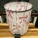 Peddle stepper trash can with pink bows