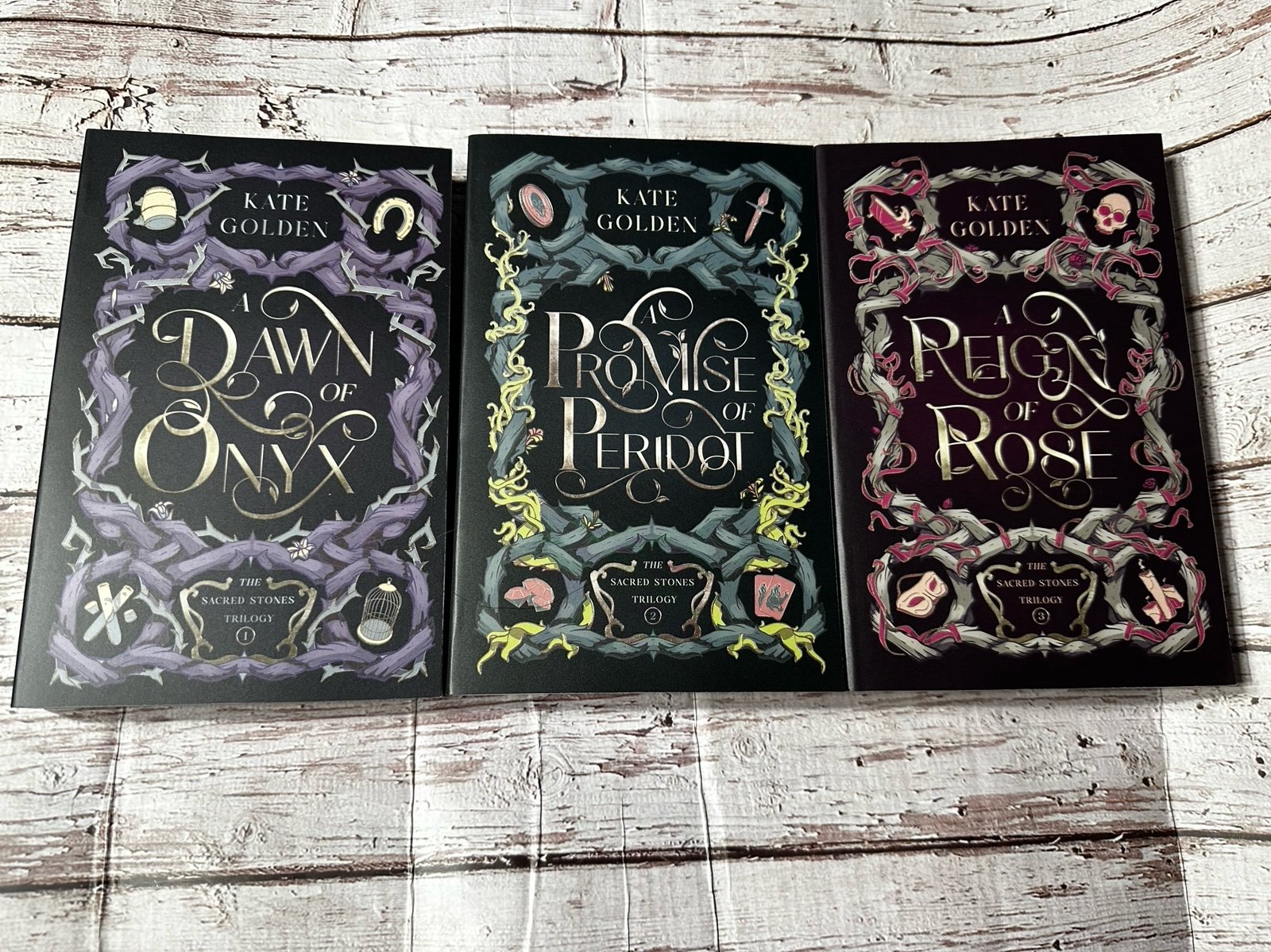 Ps the sacred stones trilogy by Kate golden paperback books