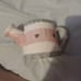 A clay watering can