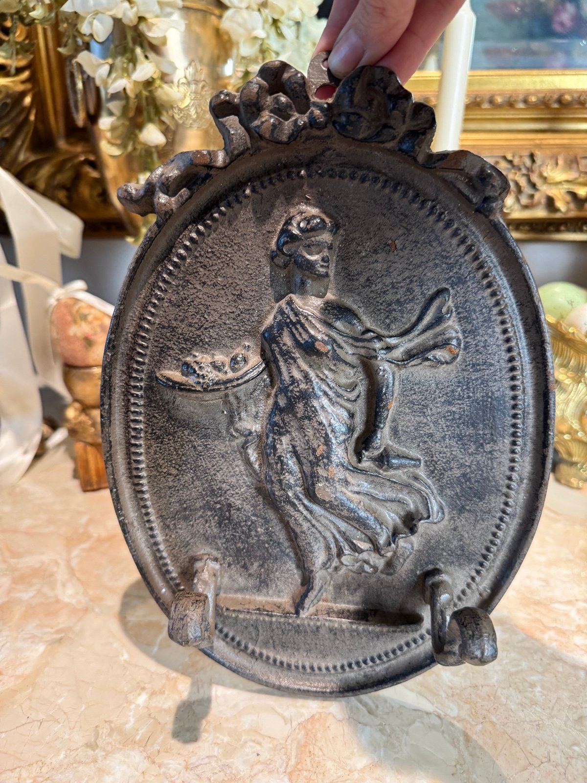 Vintage Grecian cast iron wall plaque with hooks