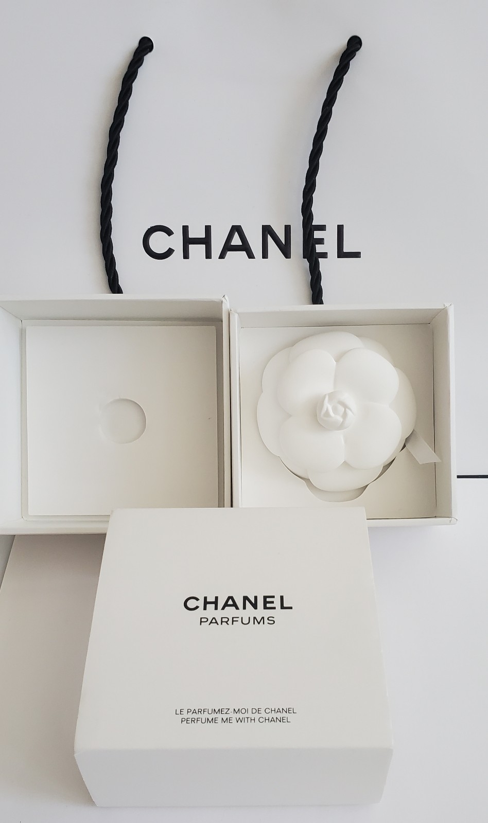 Chanel PERFUME ME WITH CHANEL CERAMIC CAMELLIA, Authentic, with Chanel bag.