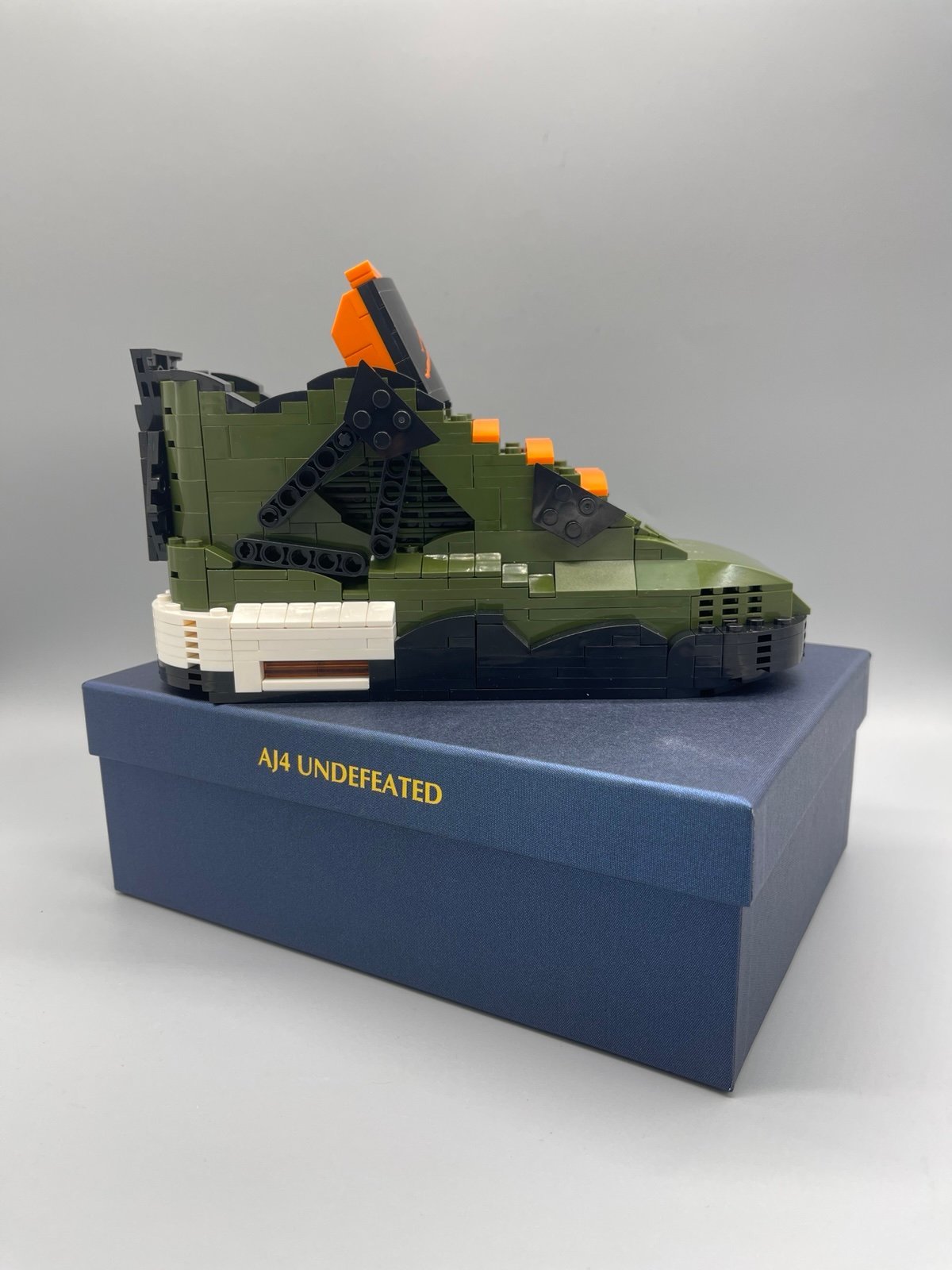 Undefeated x Air Jordan 4 Retro Kick Brick Set