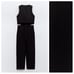 NWOT. Zara Black Darted Sleeveless V-neck Jumpsuit. Size XL.