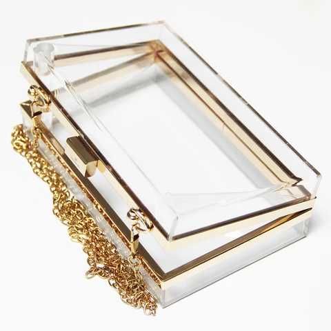 Gold trimmed clutch handbag