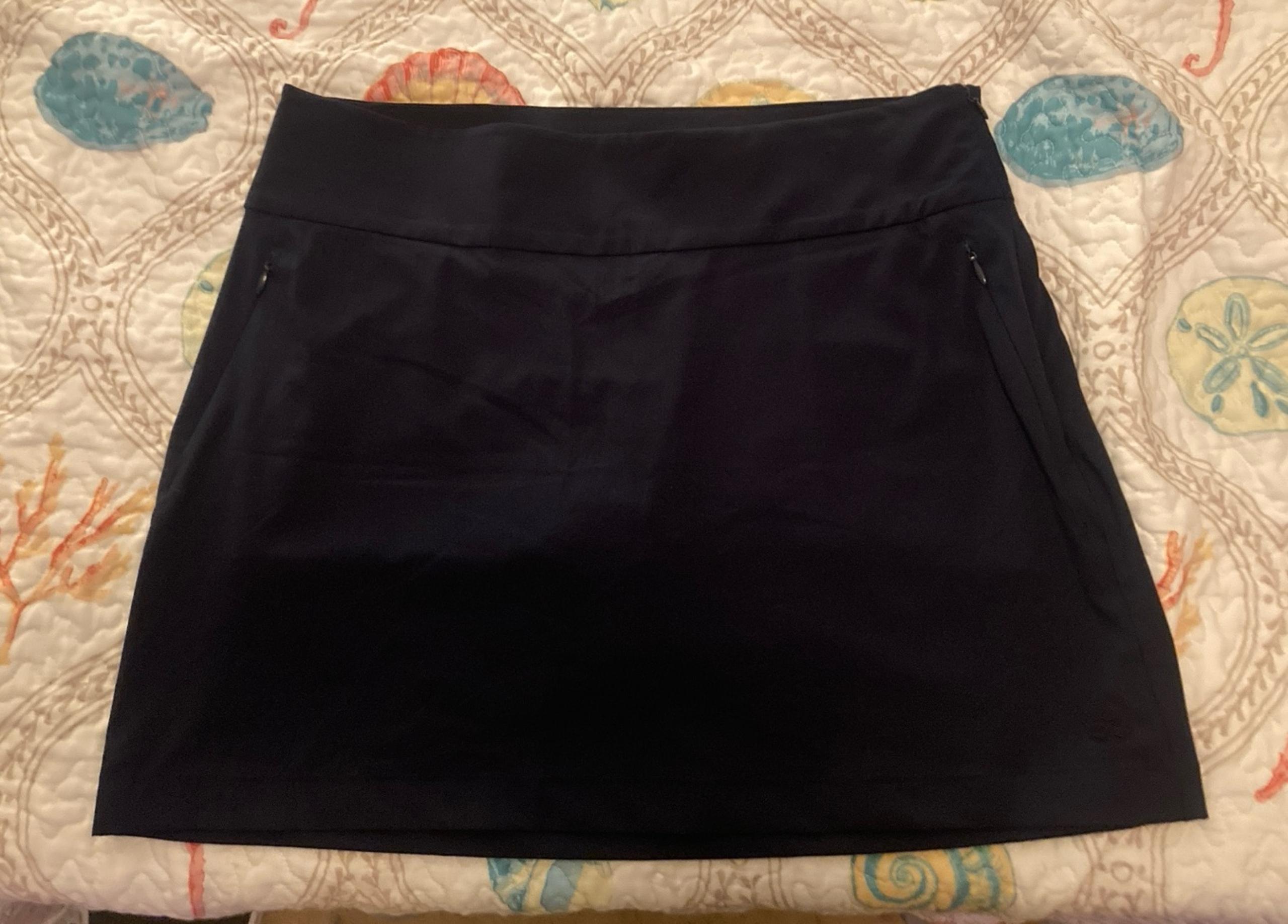 TEK GEAR Skort with zipper pockets and zip up side