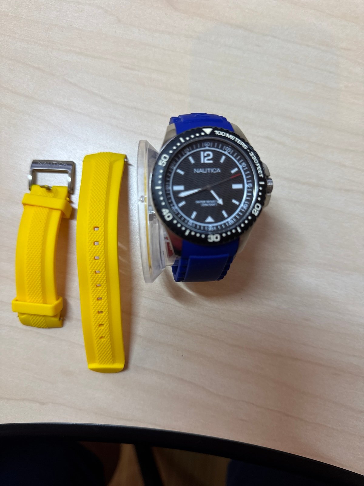 Nautica Watch w/ extra band and batteries.