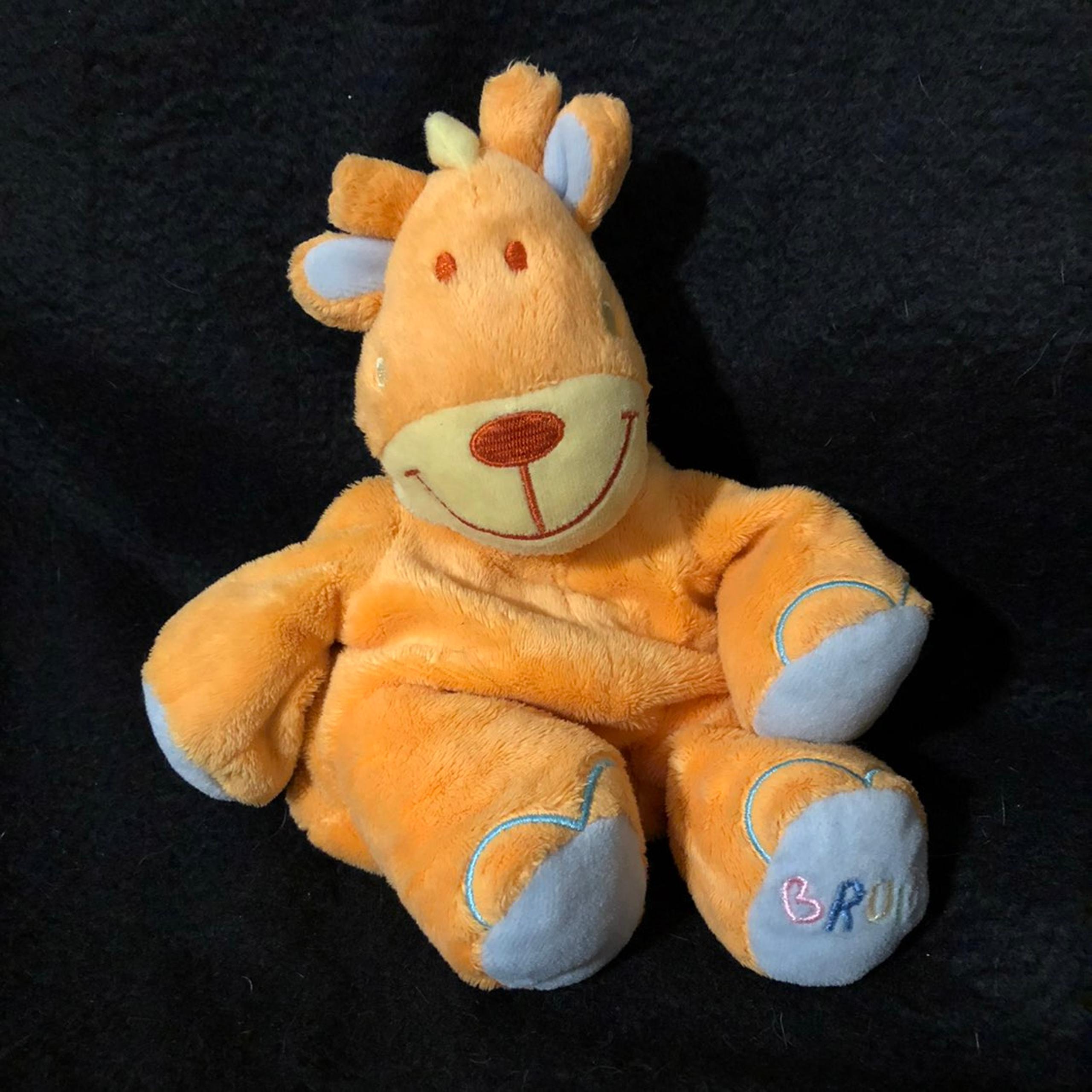 Bruin orange giraffe dragon lovey plush toy