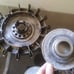 Two antique Volvo 240 hubcaps