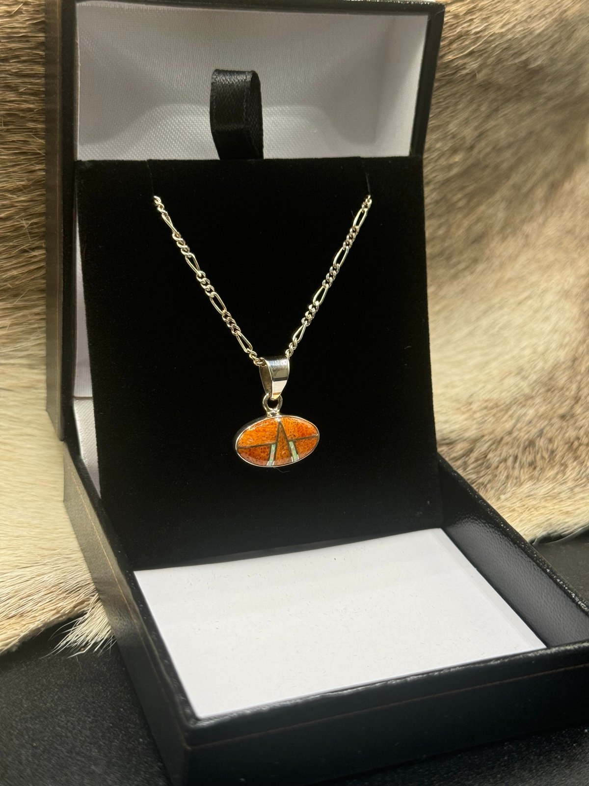 Sterling silver chain with orange spiny and opal pendant