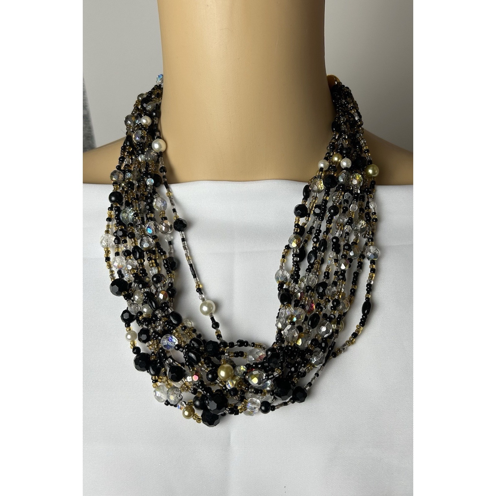 Vintage Joan Rivers Multi Strand Beaded Necklace. Measures 23