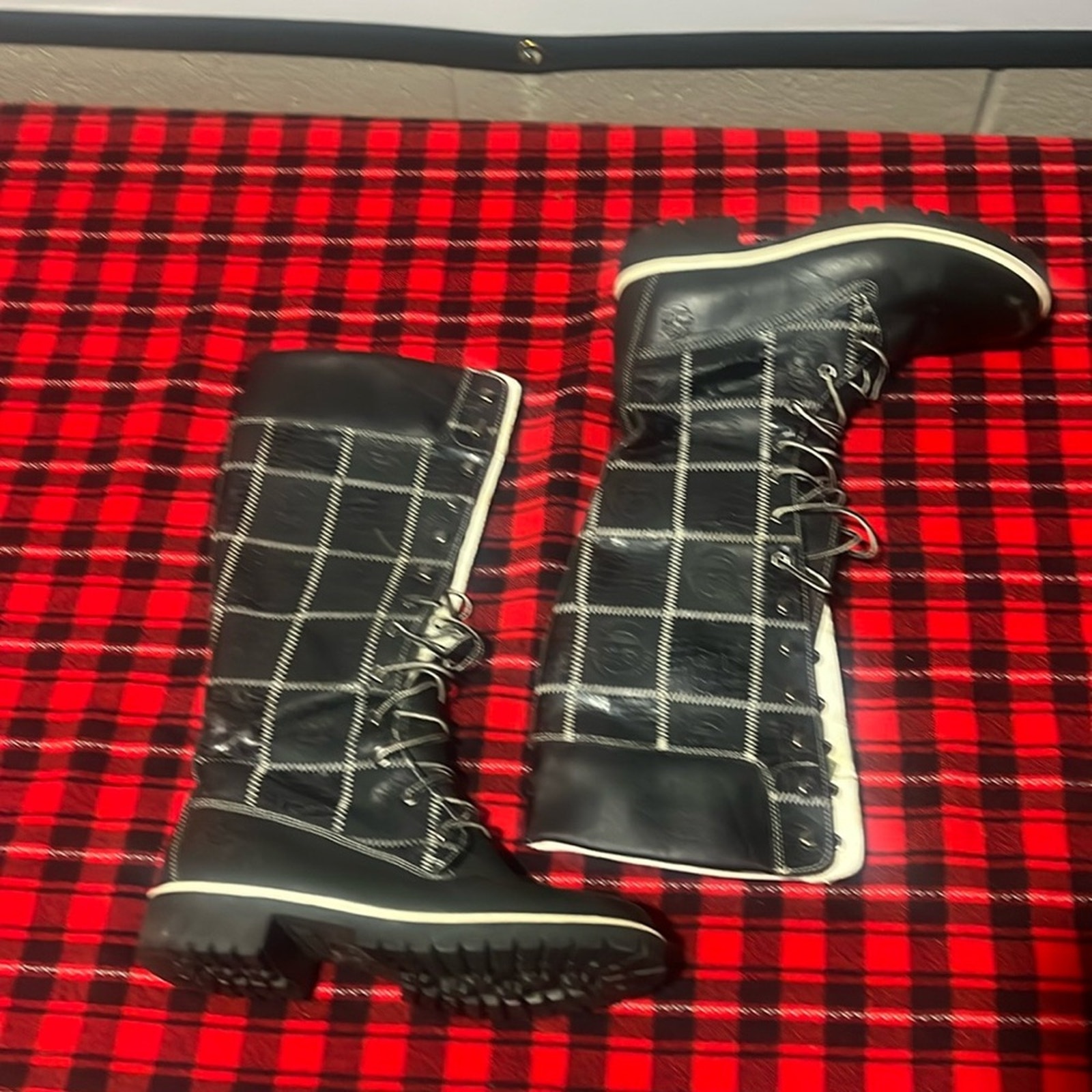 Gently used knee high lace up timberland boots