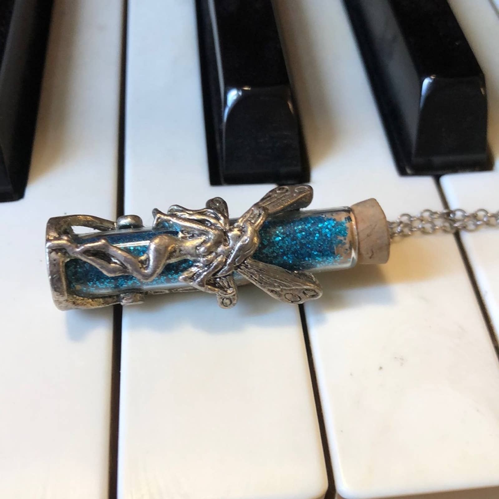 Fairy turquoise colored fairy dust in bottle necklace! Fairy turquoise colored fairy dust in bottle necklace!