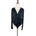 Free people bodysuit women’s size small black long sleeve faux wrap snap close