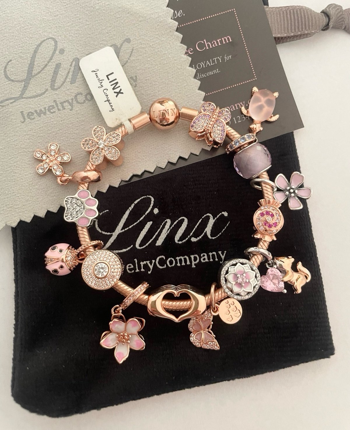 Linx Rose Gold Snake Chain Bracelet with Rose Gold Silver and Pink Themed Charms