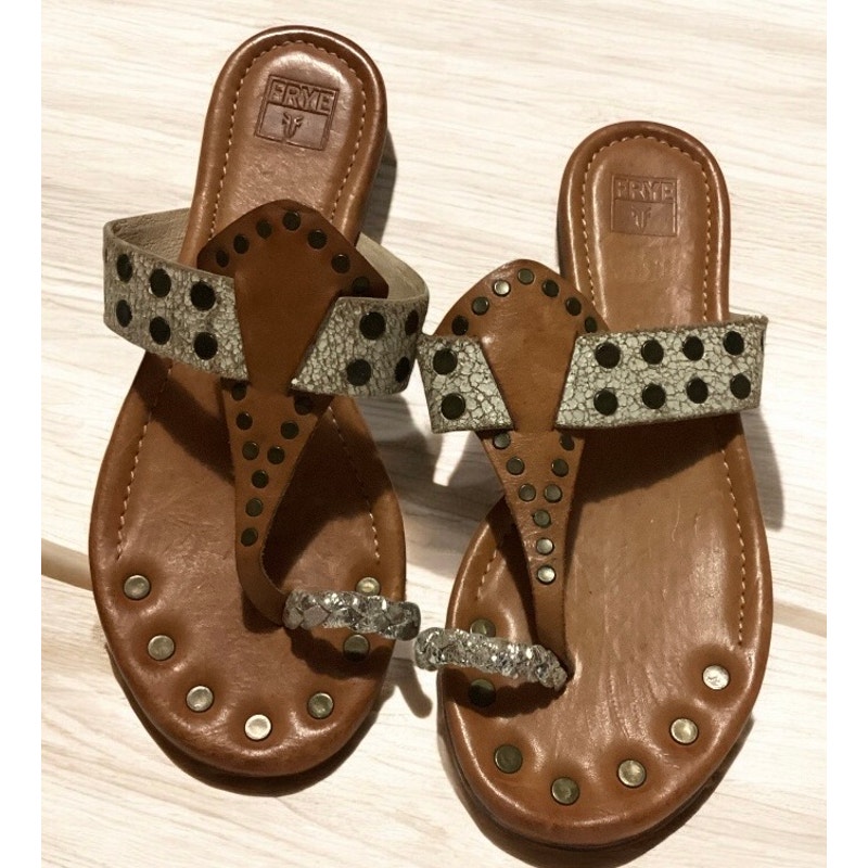 Frye tan leather sandals brass studs on the toe post. Size 8