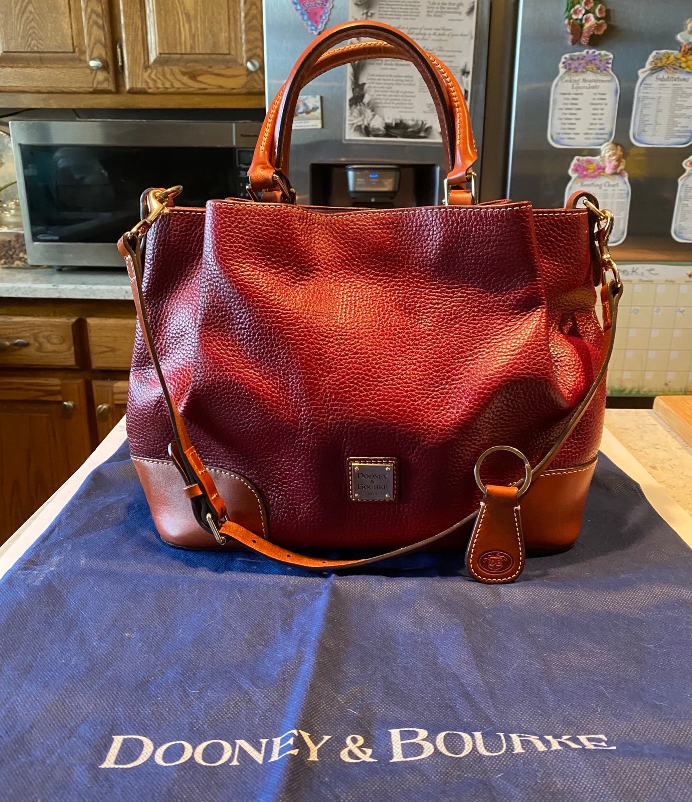 DB Barlow Maroon Pebble Florentine LeatherSaddle Trim Shoulderbag, DB Dust Cover