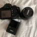 Canon T100