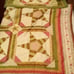Gently displayed king quilt with shams