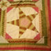 Gently displayed king quilt with shams