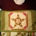 Gently displayed king quilt with shams
