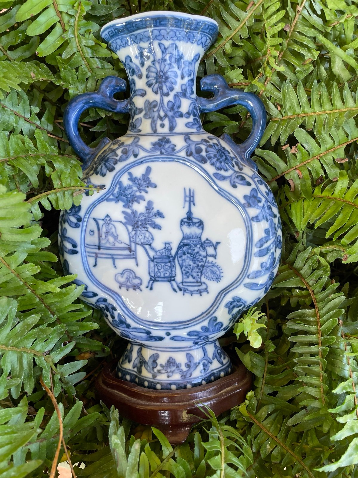 Blue Japanese vase with rosewood stand