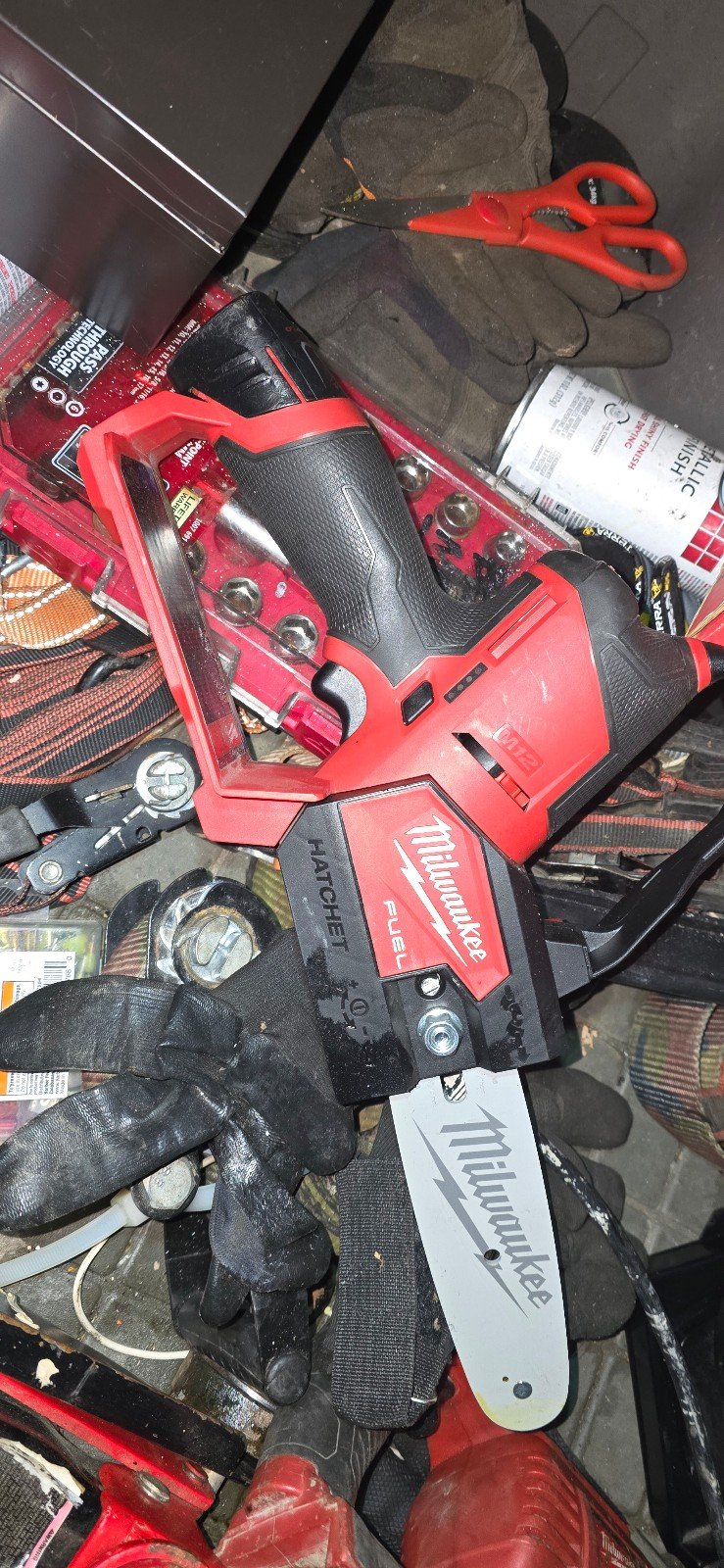 Milwaukee 6 hatchet pruning chain saw. Comes with battery but no charger.