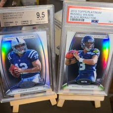 2 graded 9 and 9.5 Russell Wilson and Andrew luck rookies black refractors topps