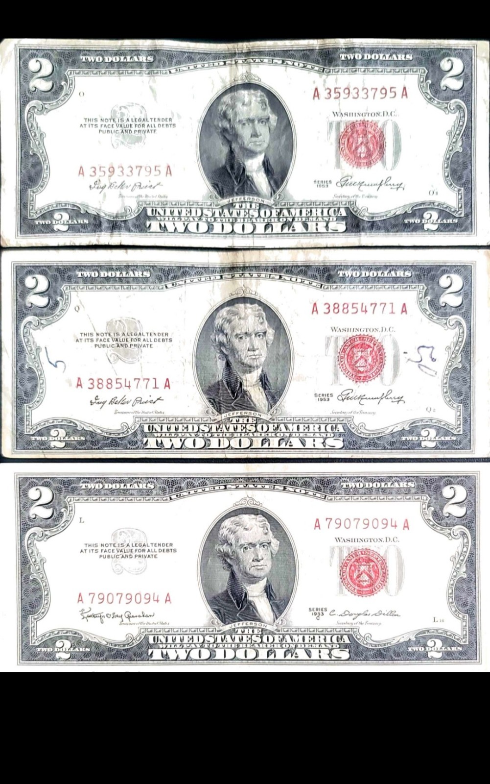 Stack of 3 2 red seal bills