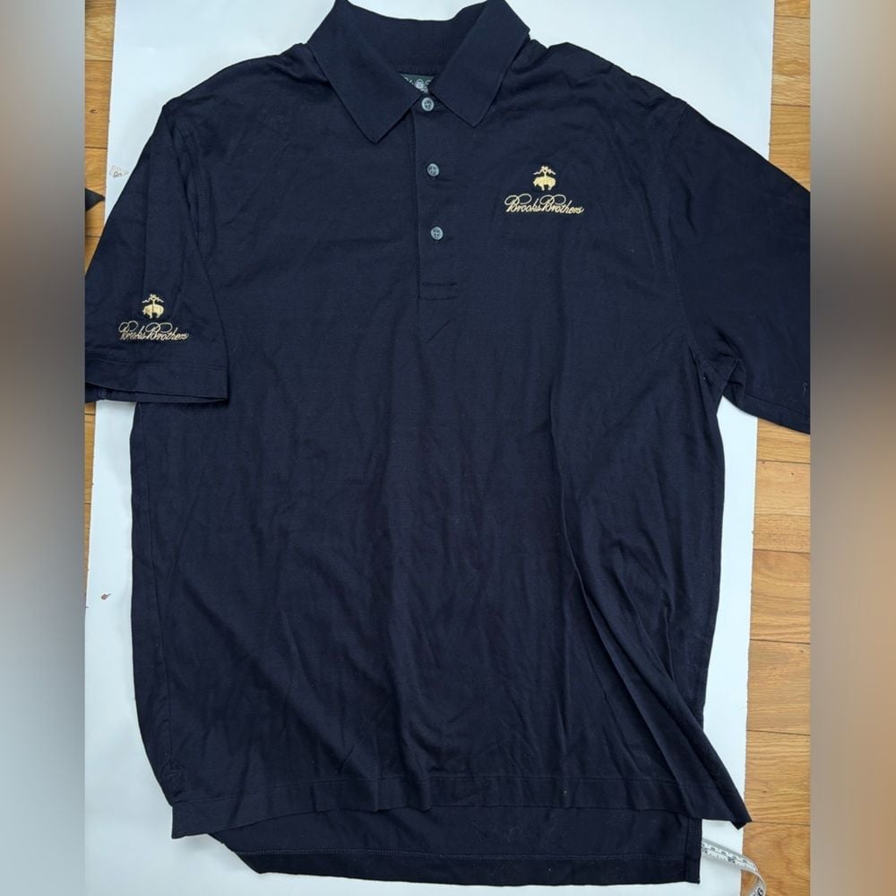 Brooks Brothers Country Club blue polo with gold stitching logo