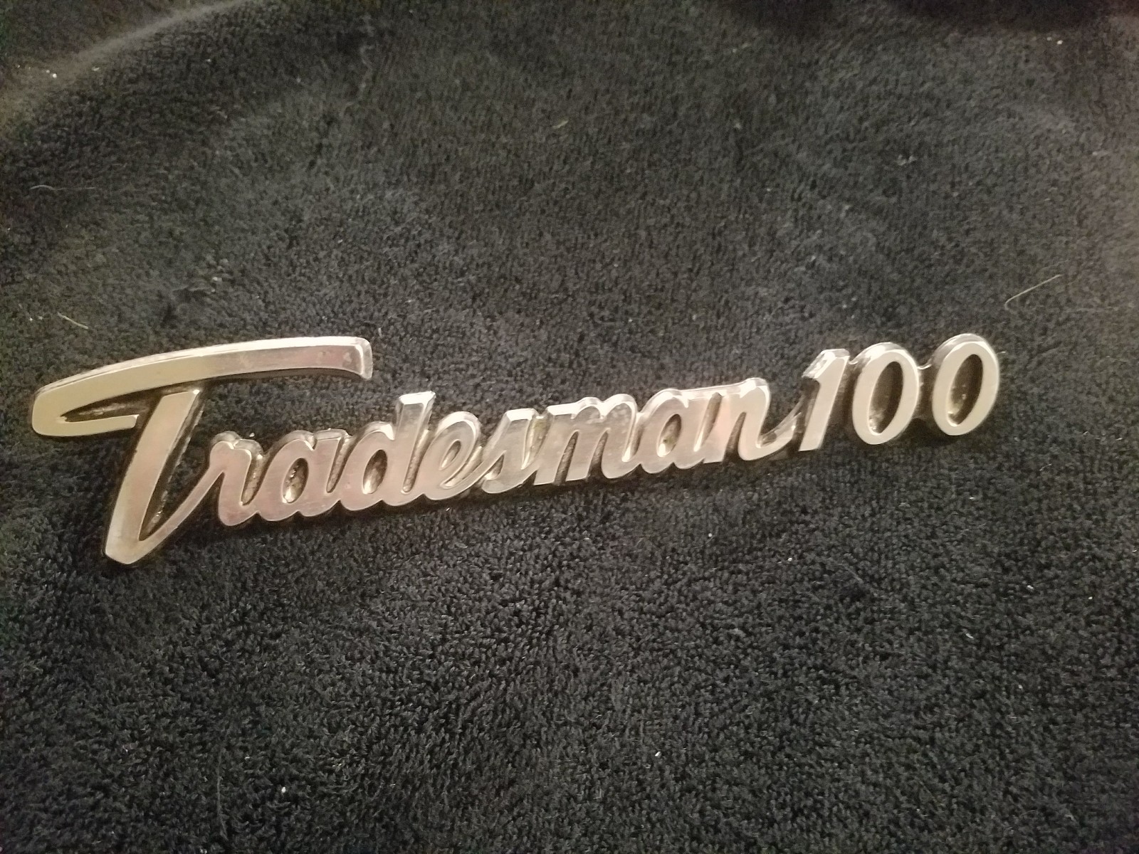 Tradesmann 100 car emblem
