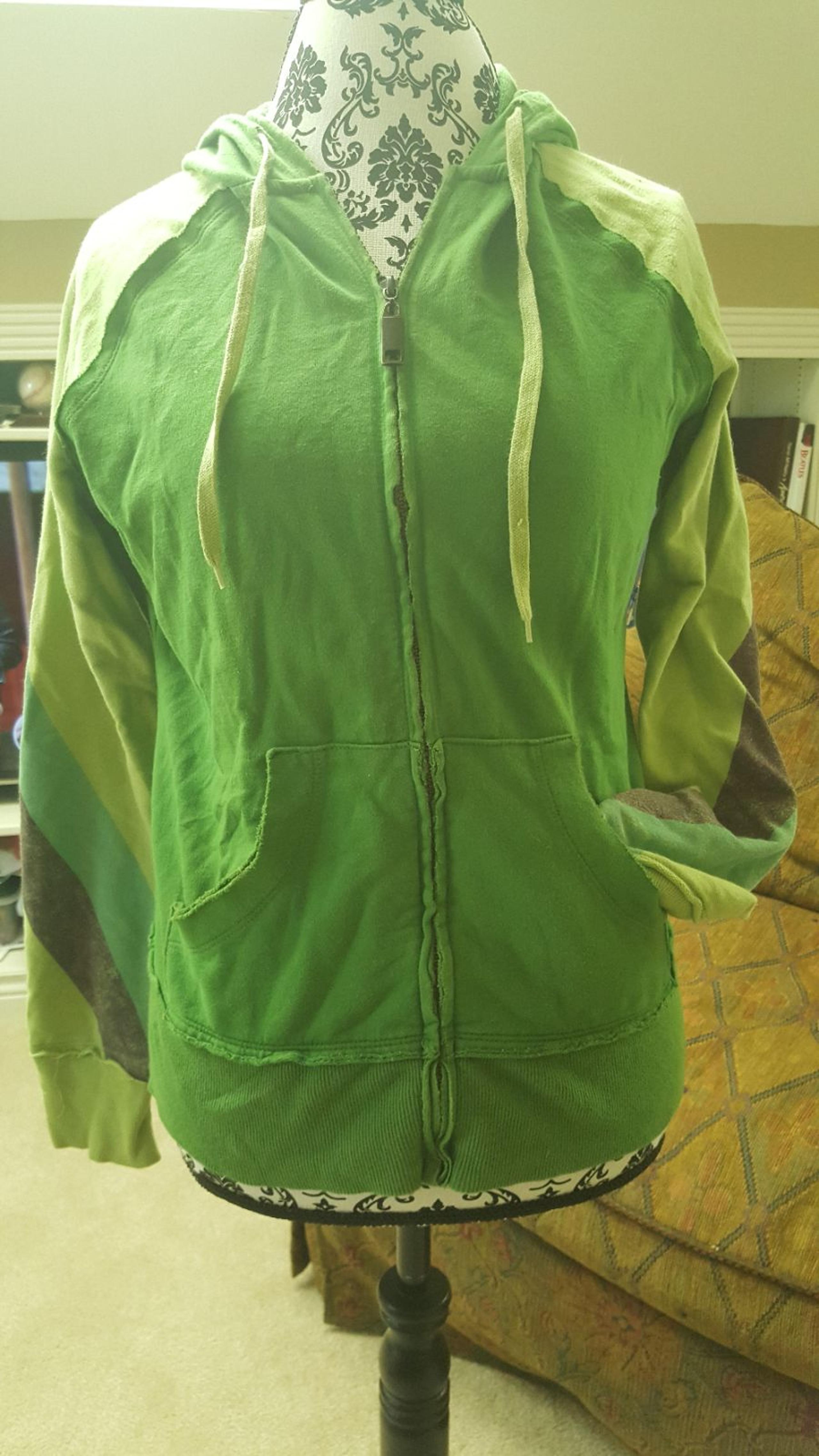 Cute green hoodie with striped sleeves