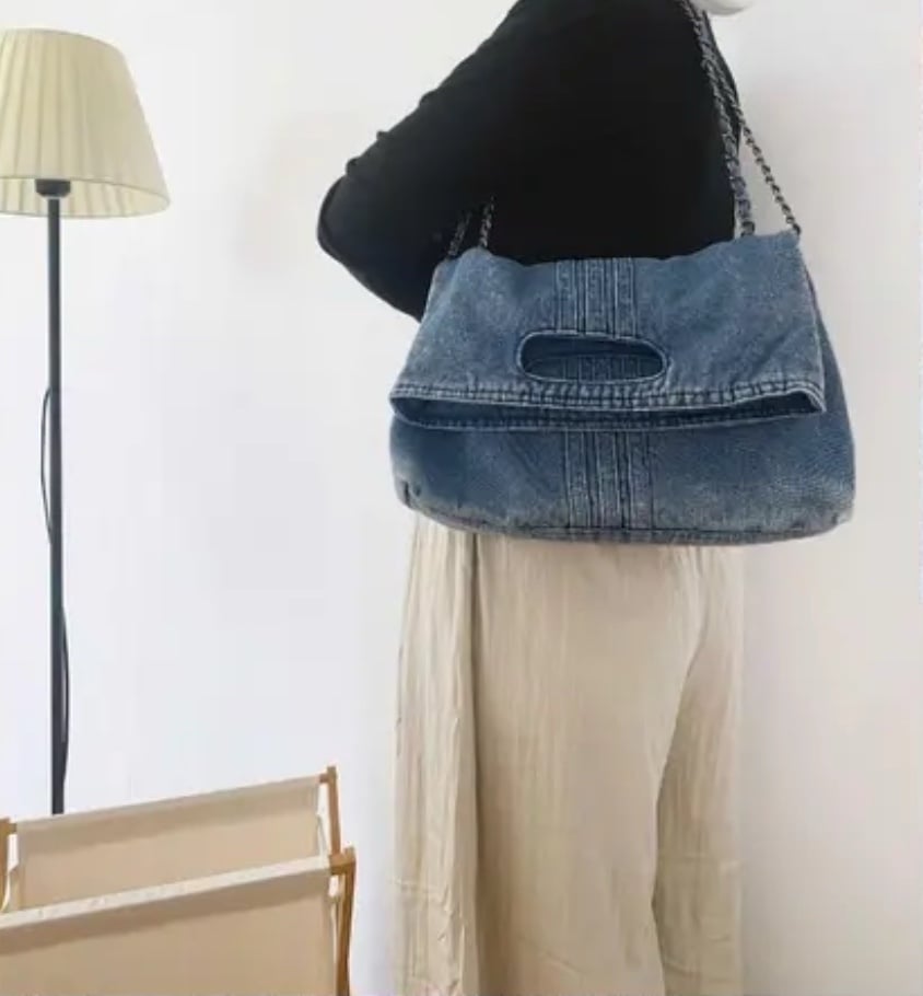 Blue denim shoulder bag with chain strap