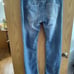 Distressed buckle jeans
