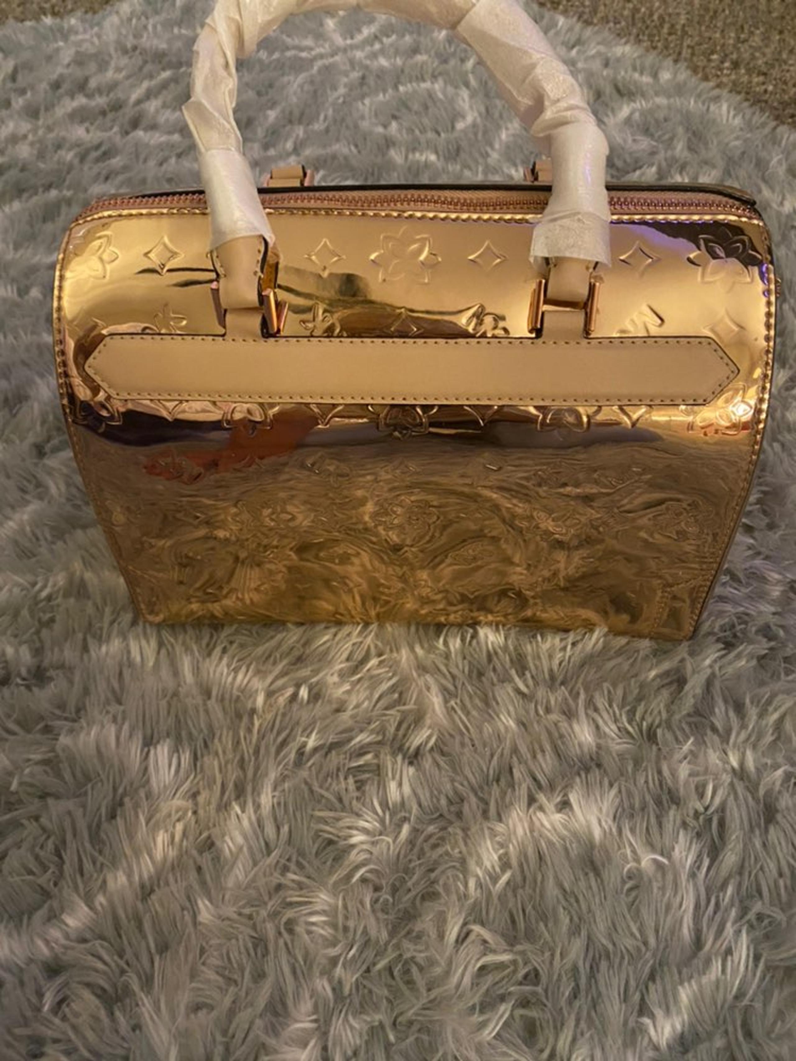 Michael kors speedy rose gold purse