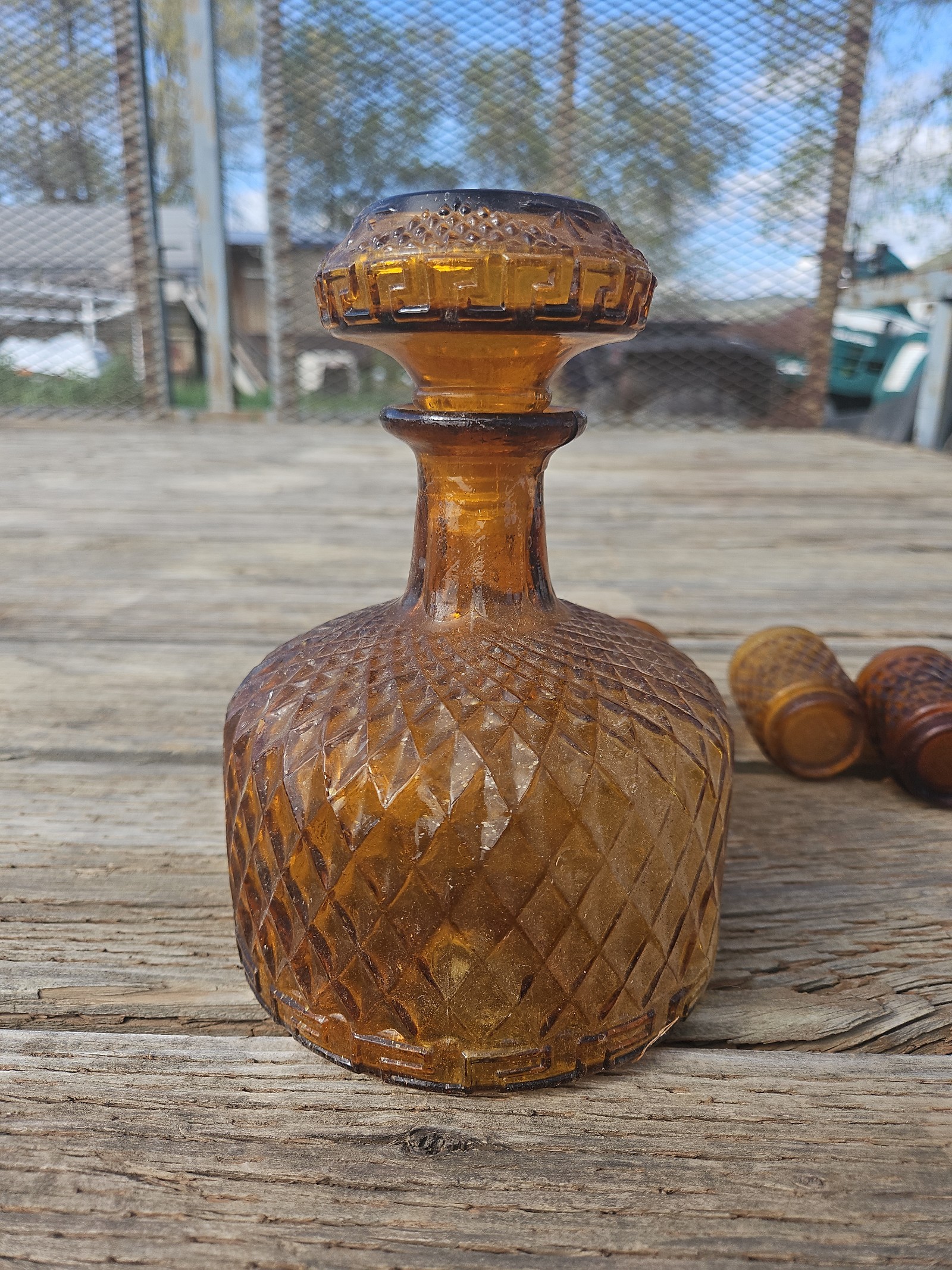 Vintage decanter with 5 shot glasses