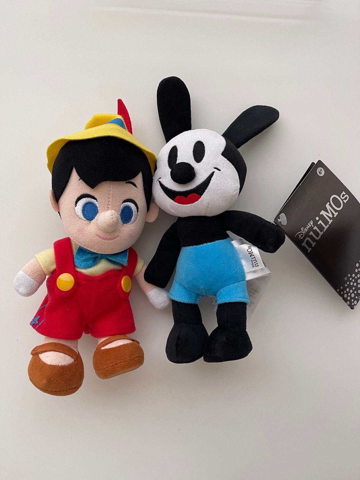 Disney NuiMOs Pinocchio and Oswald Plushies