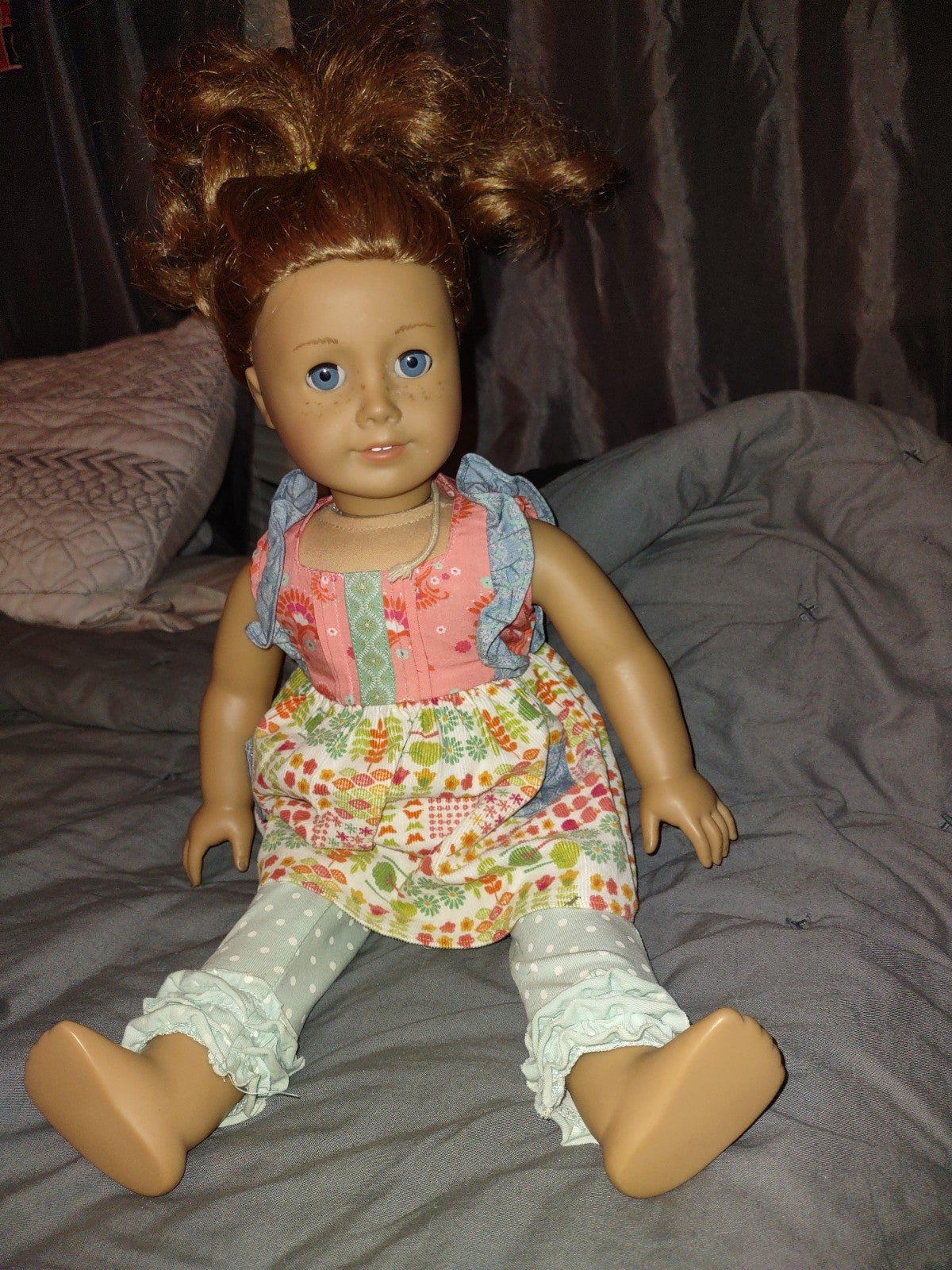 American girl doll dressed in Matilda jane