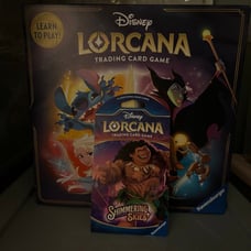 Ravensburger Disney Lorcana Trading Card Game + Shimmering Skies Booster Pack