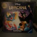 Ravensburger Disney Lorcana Trading Card Game + Shimmering Skies Booster Pack