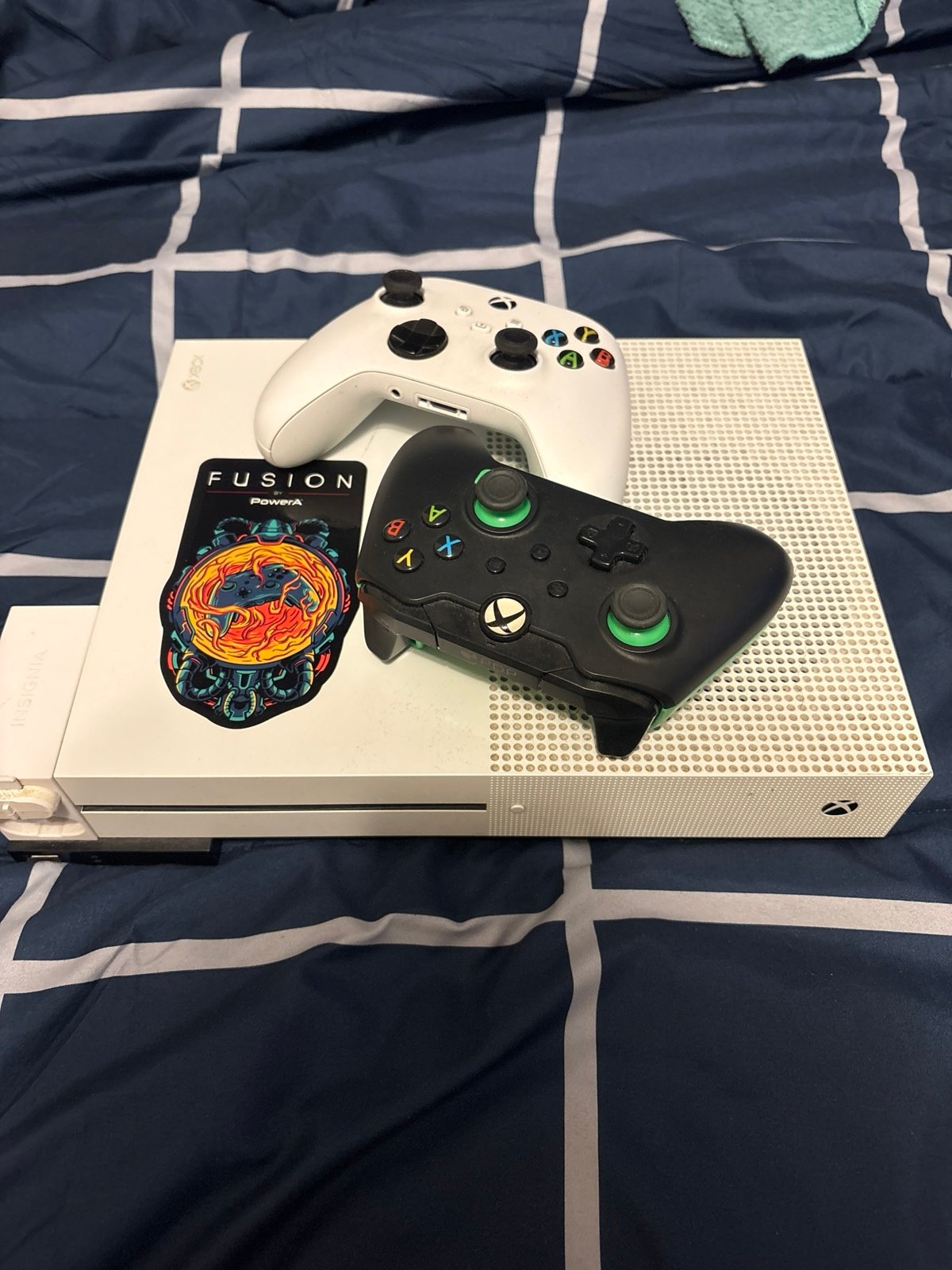 Xbox one with two controllers one wireless, and the other wired