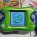 Lot of 12 LEAPSTER LEARNING GAMES With 2 LEAPSTER2 Handheld Devices