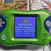 Lot of 12 LEAPSTER LEARNING GAMES With 2 LEAPSTER2 Handheld Devices