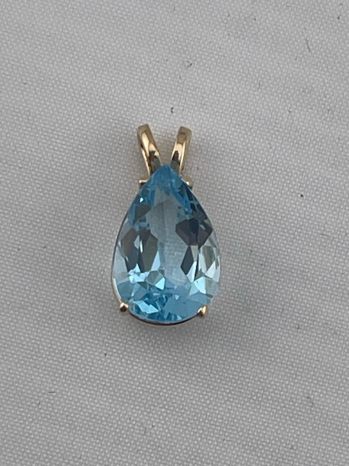 Vintage 4 carat pear shape, topaz pendant, 14 karat yellow gold