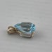 Vintage 4 carat pear shape, topaz pendant, 14 karat yellow gold